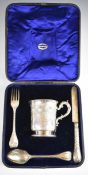 Cased Victorian hallmarked silver christening set comprising tankard, London 1862, maker Edward &