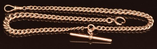 A 9ct rose gold graduated double Albert/ watch chain made up of curb links (damaged bolt clasp),