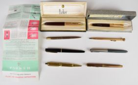 Four fountain pens comprising Waterman, two Parker 51 and one further Parker together with a