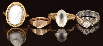 A 9ct gold ring set with a cameo, 9ct gold ring set with paste, 9ct gold signet ring and a 9ct white