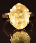 A 9ct gold ring set with an oval cut citrine, 3.5g, size J