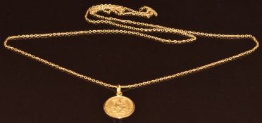 A yellow metal religious pendant on chain (tests as 18k gold), 4.5g, 1.5cm, 60cm