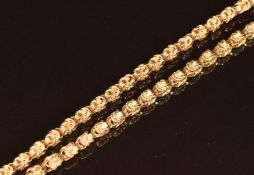 A 14ct gold necklace made up of knotted links, 64.2g, 81cm