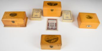 Four Mauchlineware boxes comprising The Bridge, Clun jewellery box, The Valley and Grand Hotel