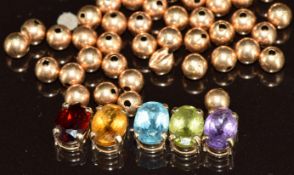 A collection of 9ct gold sphere links, sections of 9ct gold chain (3g) and a garnet, topaz,