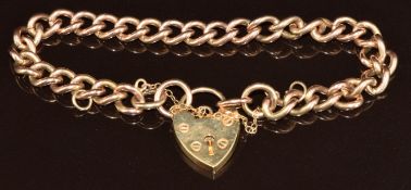 A 9ct gold curb link bracelet with heart padlock clasp, 20.2g, 18cm