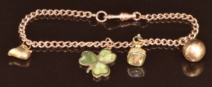 A 9ct gold charm bracelet with three 9ct gold charms (9.1g) and a Victorian intaglio seal