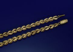 Two Georgian gold bracelets made up of textured links and with barrel clasps, 6.8g, 16.5cm