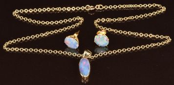 A 9ct gold pendant set with an opal triplet (5.3g, 44cm, 2.2cm) on 9ct gold chain, with similar