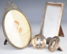 Four silver photograph frames, the larger rectangular one hallmarked, height 19.5cm, the large