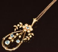 Edwardian 15ct gold pendant set with aquamarines and pearls (4.8g, 5cm) on 9ct gold chain (1.5g,