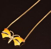 A 9ct gold necklace in the form of a butterfly set with enamel, 5.2g, 38cm