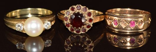 A 9ct gold ring set with a cluster of garnets (2.1g, size J), 15ct gold ring (stones missing, 2g)