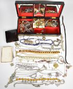 A collection of jewellery including Napier earrings, eleven diamanté necklaces, two diamanté