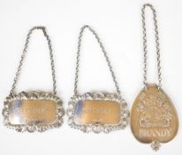 Three hallmarked silver decanter or bottle tickets comprising a Queen's Silver Jubilee limited