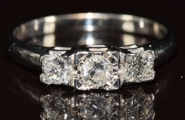 A 9ct white gold ring set with three round cut diamonds each approximately 0.15ct, 2.4g, size N