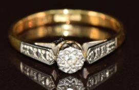 An 18ct gold ring set with a diamond in a platinum setting, 1.7g, size I