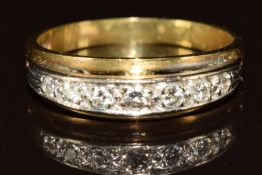 A 18ct gold ring set with diamonds, 3.6g, size M