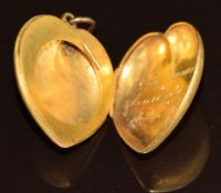 Georgian yellow metal heart locket with textured finish engraved inside 'Geo Mainwaring born 10th
