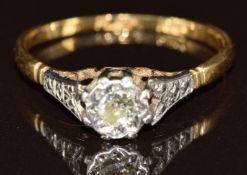 An 18ct gold ring set with a diamond of approximately 0.15ct  in a platinum setting, 2g, size N