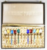 Cased set of ten David Andersen Norwegian silver gilt and coloured guilloché enamel coffee spoons,
