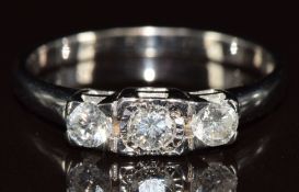 A 9k white gold ring set with three round cut diamonds each approximately 0.12ct, 2.4g, size P