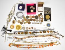 A collection of jewellery including silver pot, six silver chains, silver locket, two silver St