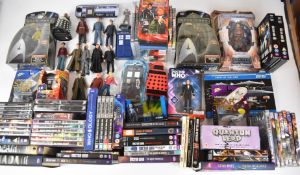 A collection of Doctor Who and Star Trek books, toys and DVDs, the majority in original boxes or