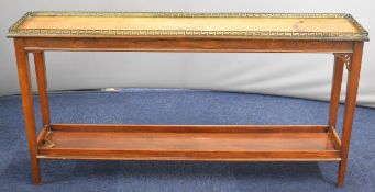 19th century mahogany and rosewood shelf unit with Greek key decoration to the galleried edge,