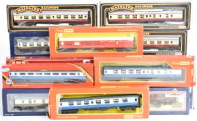 Eighteen 00 gauge model railway passenger carriages by Hornby, Lima, Bachmann, Mainline and