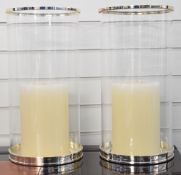 Pair of Ralph Lauren chrome and glass candle holders, diameter 23 x H46cm