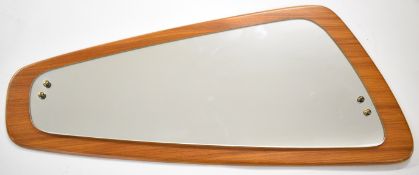Mid century modern shaped teak mirror, H77cm