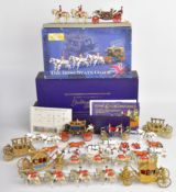 Seven diecast metal and plastic Royal State coaches by W Britain, Corgi and similar, two in original