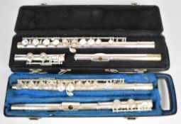 Two flutes comprising Bundy II (Selmer) and an Arbiter Pro Sound, both in hard shell cases.