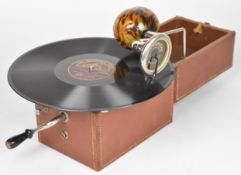 Cameraphone portable gramophone with faux tortoiseshell resonator, in fitted tan leather carry case,