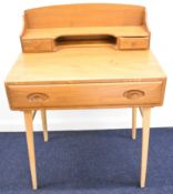 Ercol Windsor range Model 479 retro mid century light elm desk, having single long drawer and