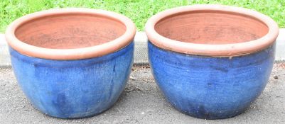 Pair of blue jardinières / garden planters with unpainted rims, diameter 46cm, height 31cm