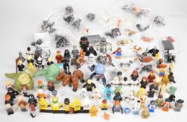 Over ninety Lego minifigures comprising characters from Star Wars, Harry Potter, Marvel and Avatar.