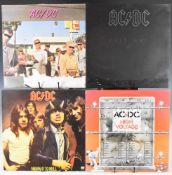 Collection of five AC/DC Hard Rock LPs comprising High Voltage, Highway To Hell, Back In Black,