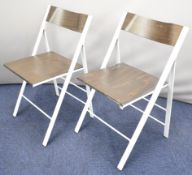 Pair of Area Declic 'Pockett' designer folding chairs