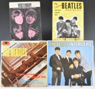 Five Beatles LPs together with 'Yesterday' sheet music and the Fabulous Beatles Souvenir song