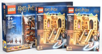 Three Lego Harry Potter sets comprising The Shrieking Shack & Whomping Willow 76407 and Hogwarts