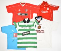 Group of five shirts comprising Liverpool F.C. signed replica shirt 2006 Number 9 autographed by