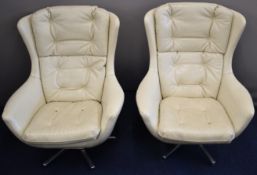 Pair of mid century modern style swivel Chesterfield armchairs, height 103cm