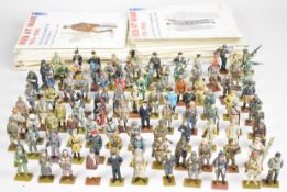 Ninety seven Del Prado 'Men at War' painted metal soldiers, with accompanying magazines.