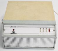 Dansette Monarch turntable record player with turquoise and cream textured vinyl finish,