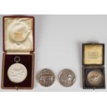 Four agricultural interest medallions comprising two National Pig Breeders Association examples