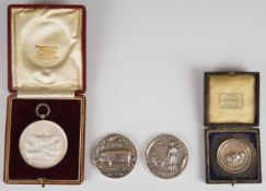 Four agricultural interest medallions comprising two National Pig Breeders Association examples
