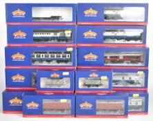 Twenty two Bachmann Branch-Line 00 gauge model railway passenger carriages and goods wagons, all