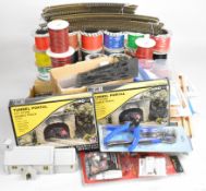 A collection of 00 gauge model railway components and accessories to include track, wire,